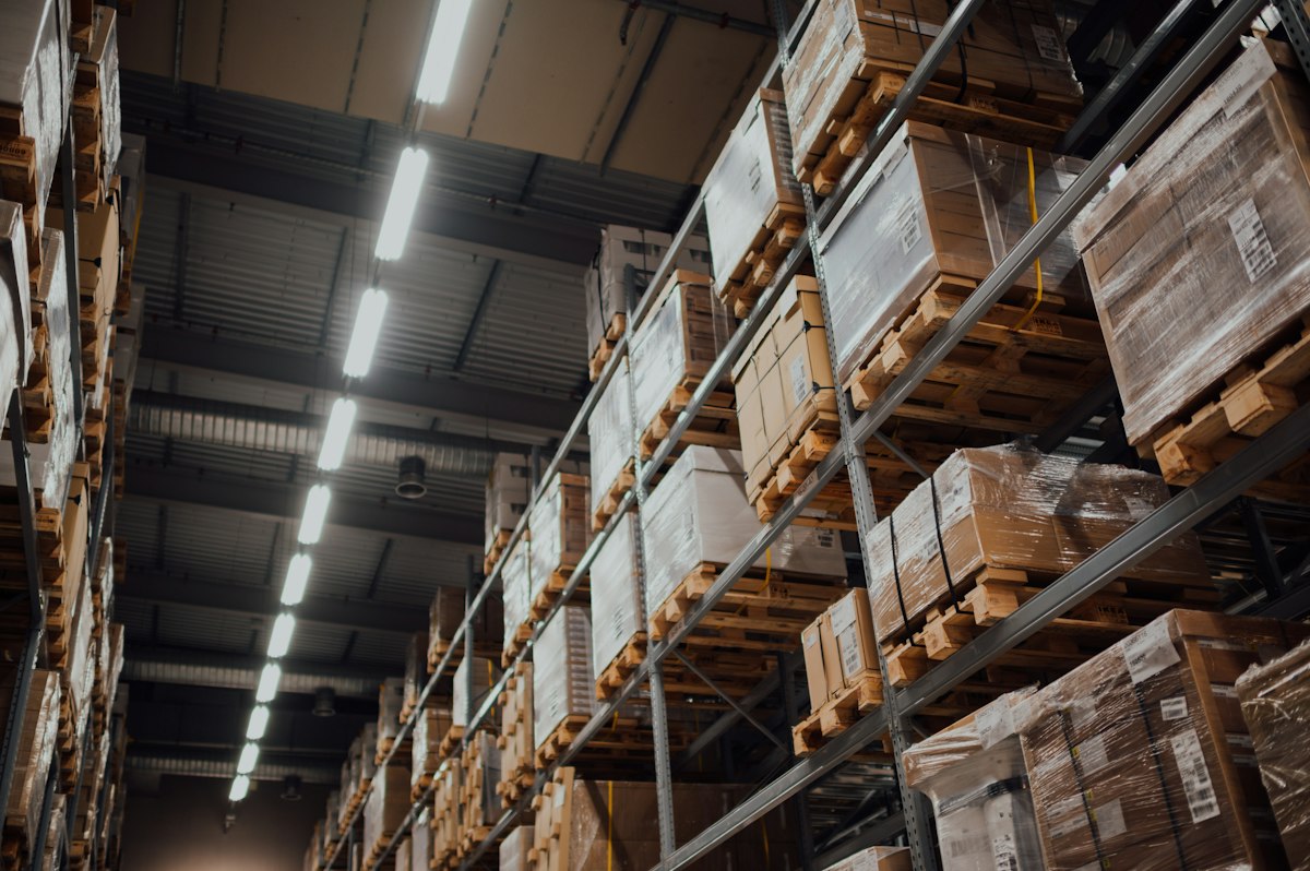 Cardboard cartons stored on warehouse shelving